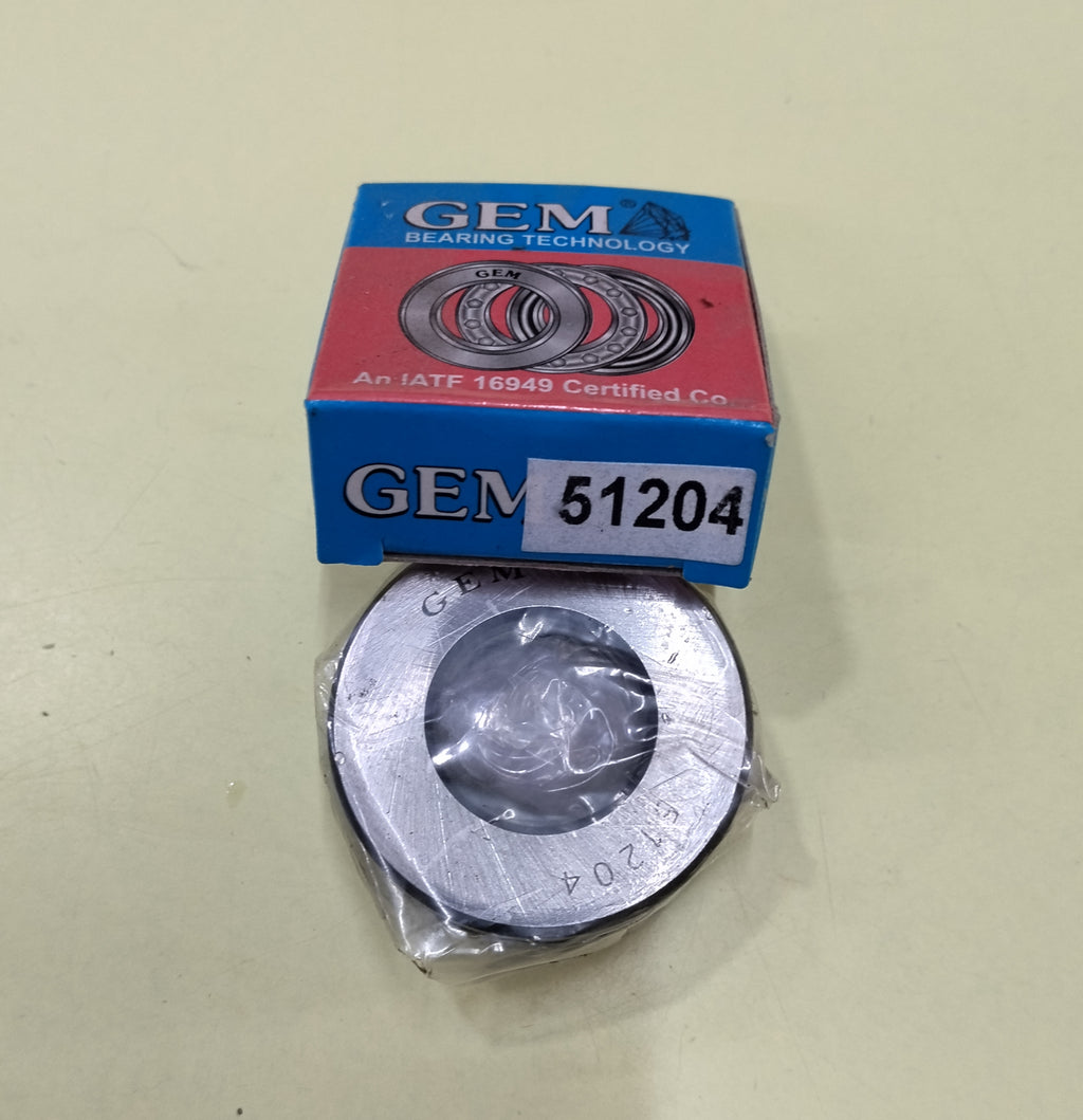 A GEM bearing product shown with its blue and red branded box above a packaged metal bearing on a plain beige surface. The box reads GEM Bearing Technology and includes the number 51204.