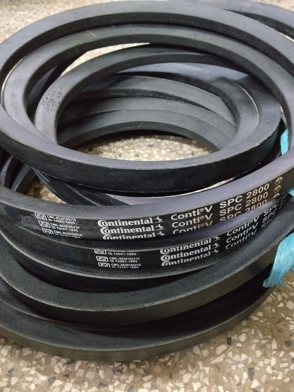 A coil of Continental ContiV SPC 2800 rubber V belt.