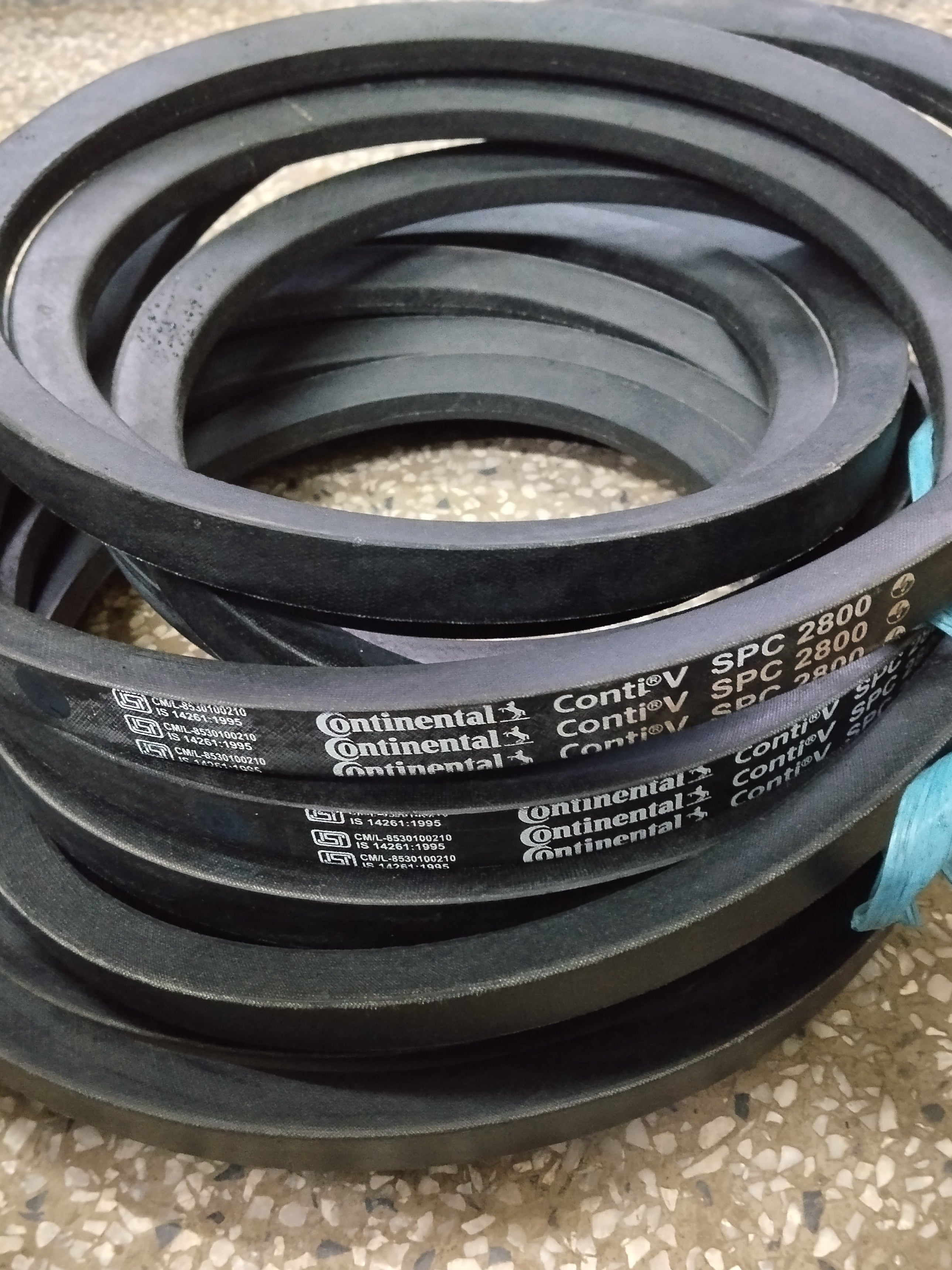 A coil of Continental ContiV SPC 2800 rubber V belt.